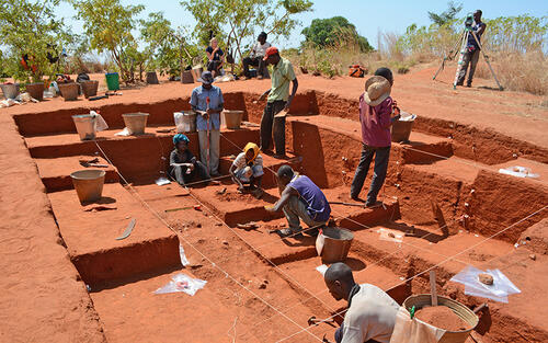 people at an excavation site